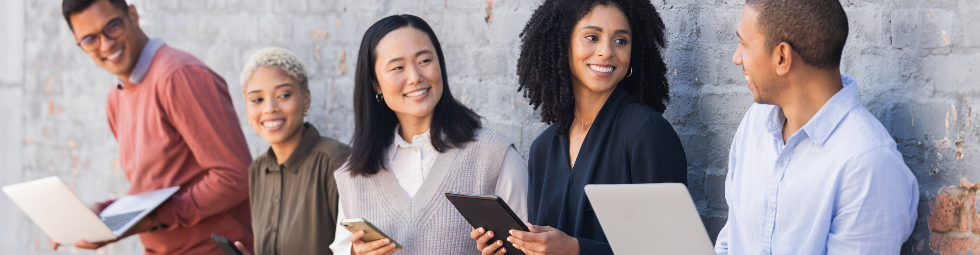 A group of people smiling.