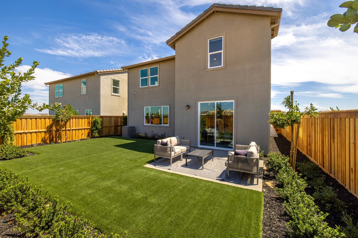 New home exterior with backyard by Century Communities in Mountain House, CA