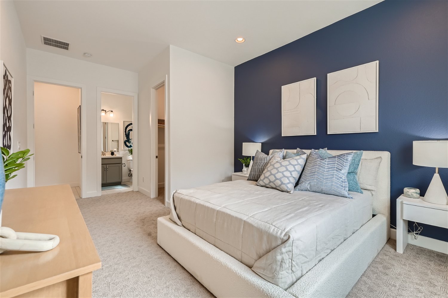 A living room with a couch and a table.