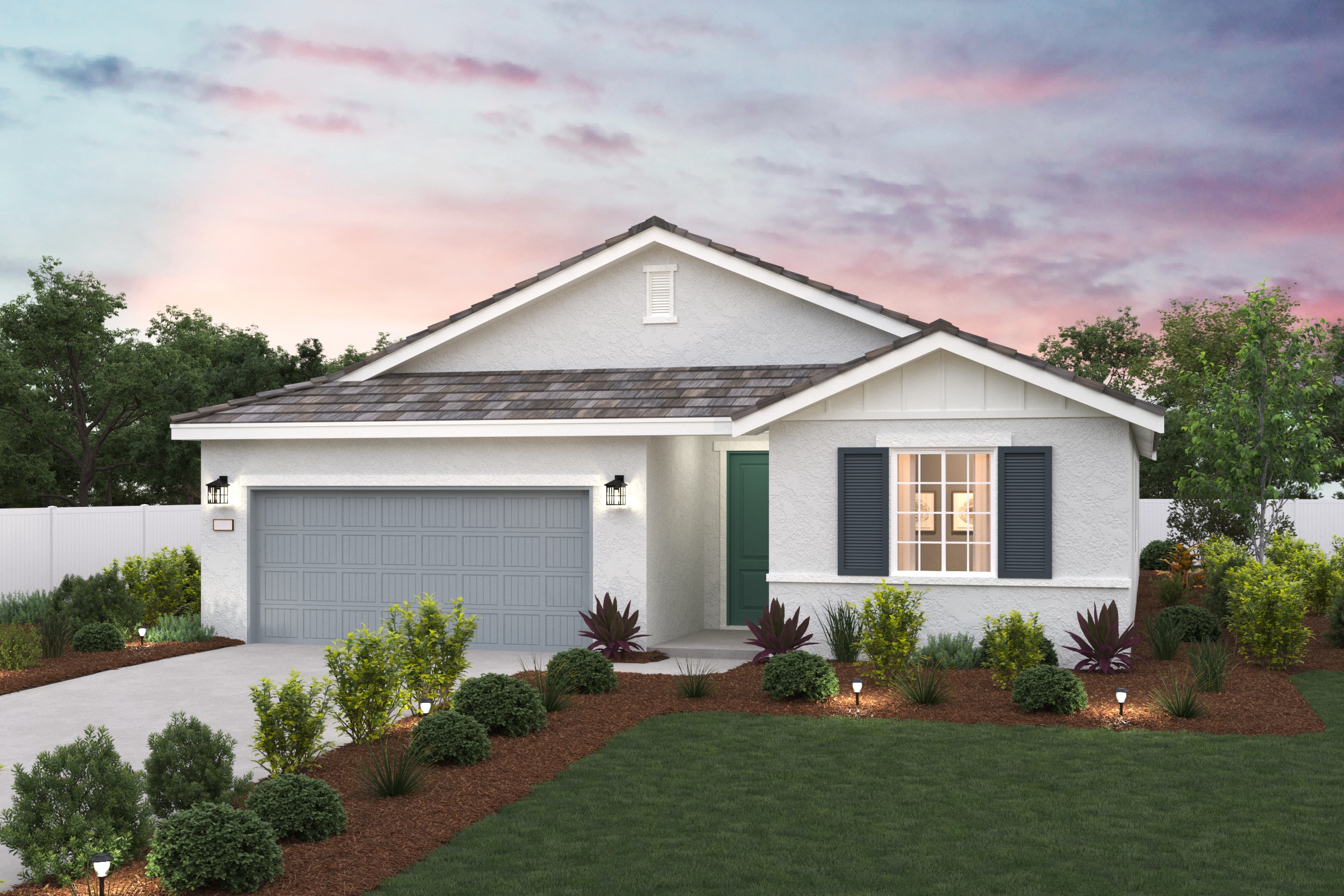 A house with a driveway and a lawn with bushes and trees.