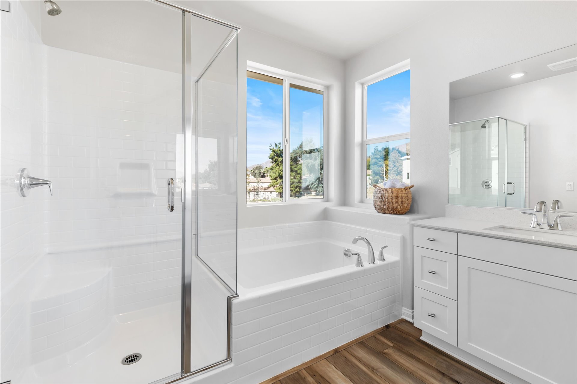 A bathroom with a tub and sink.