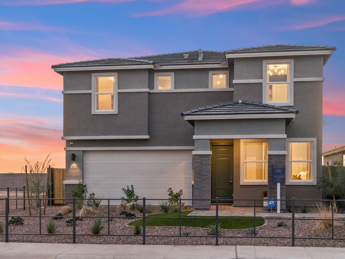 A house with a fence around it.