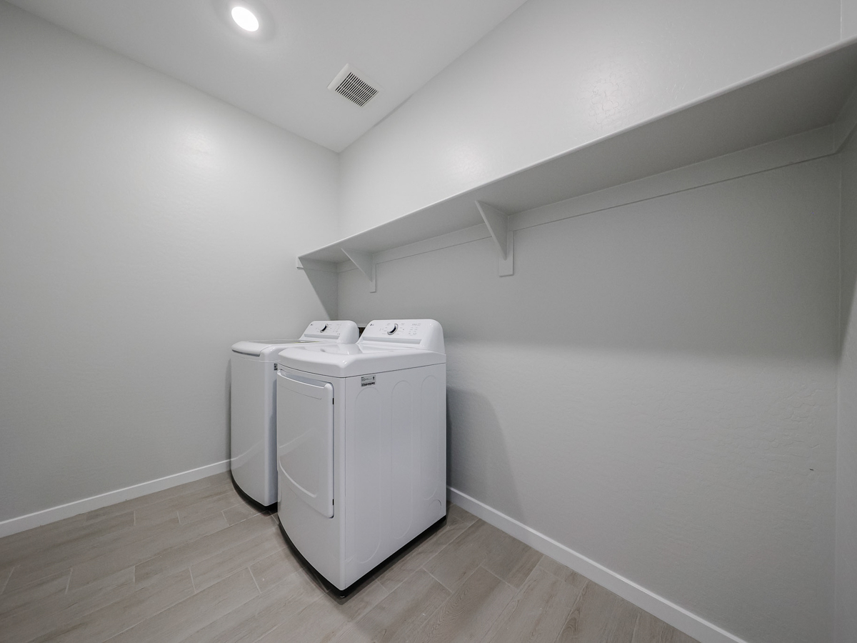 A white rectangular object in a room.