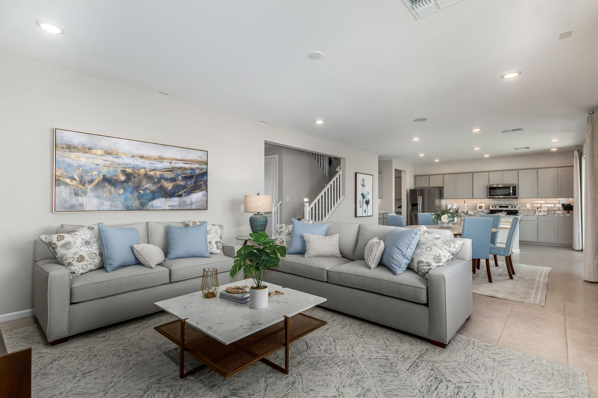 A living room with a couch and a coffee table.