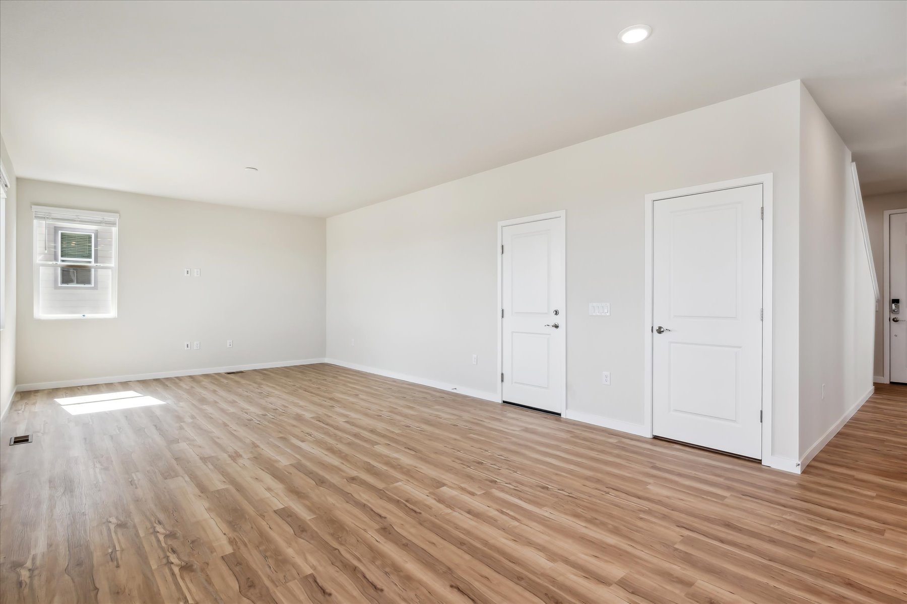 A room with white doors.
