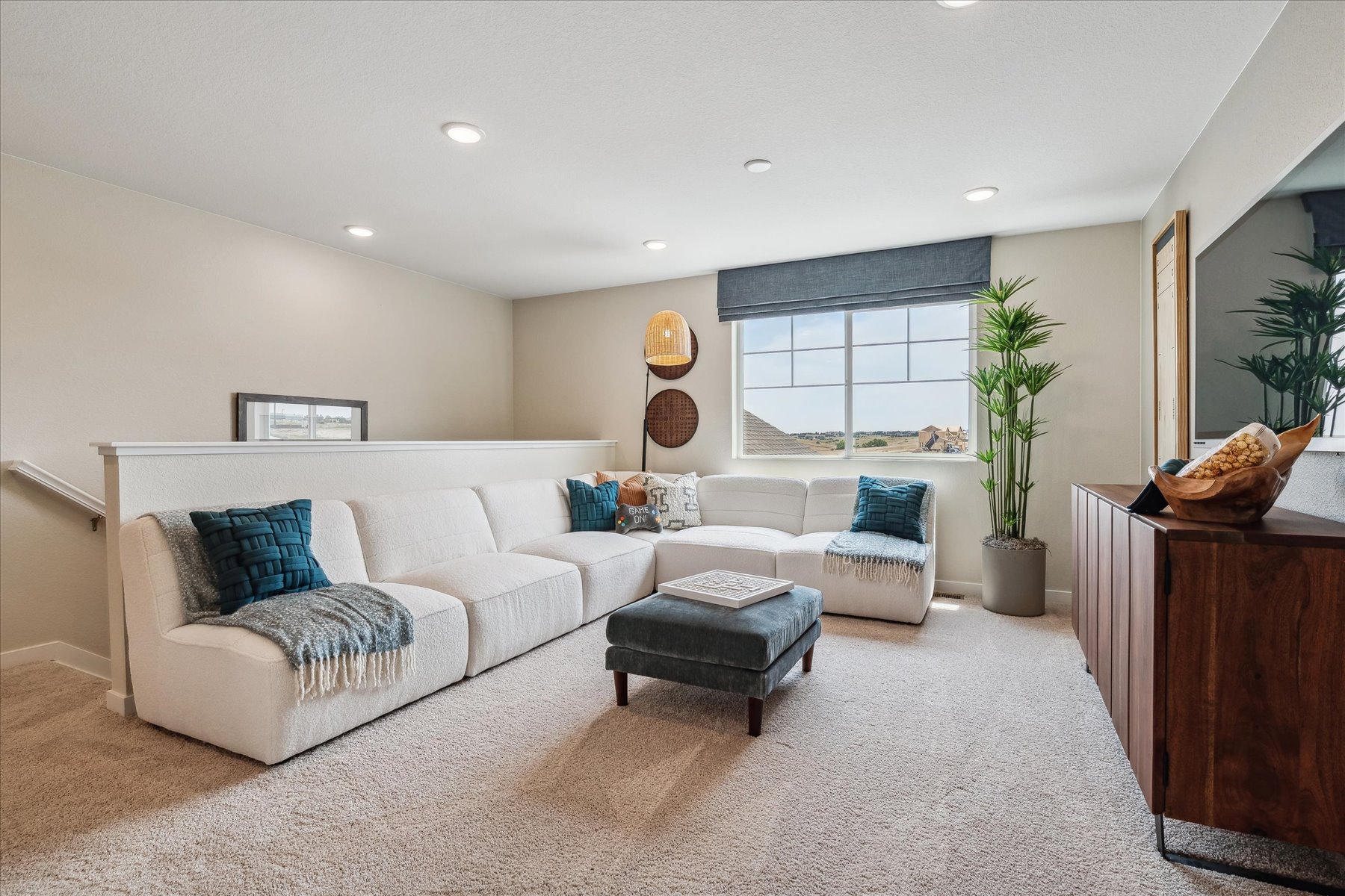 A living room with a couch and a coffee table.