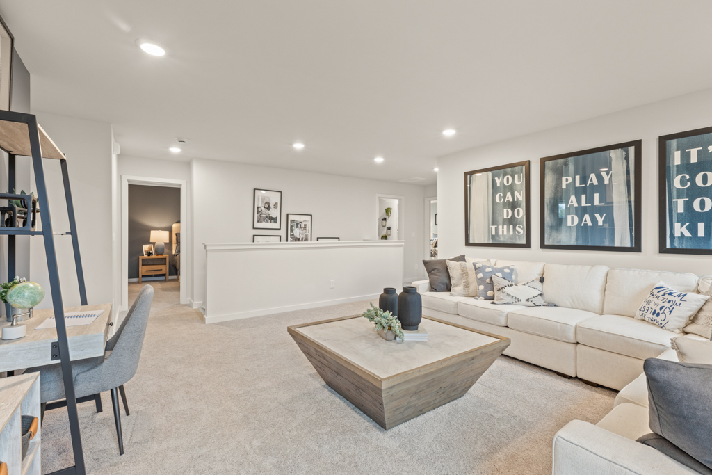 A living room with a couch and a coffee table.