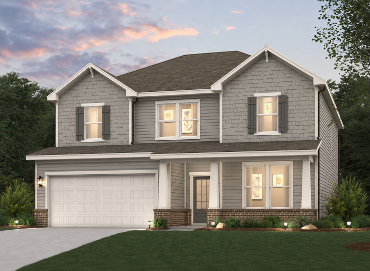 A house with a large front yard.