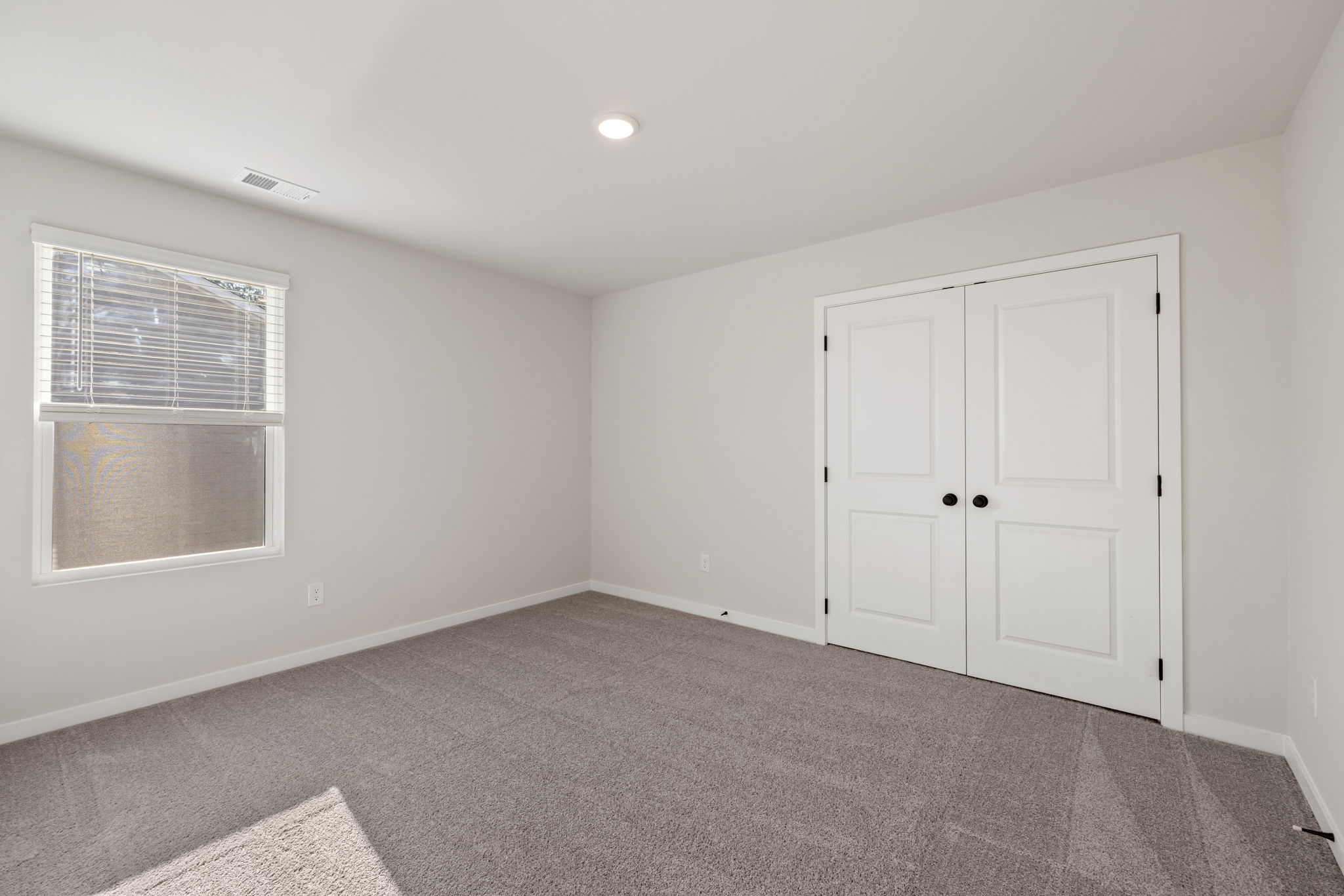 A room with white doors.