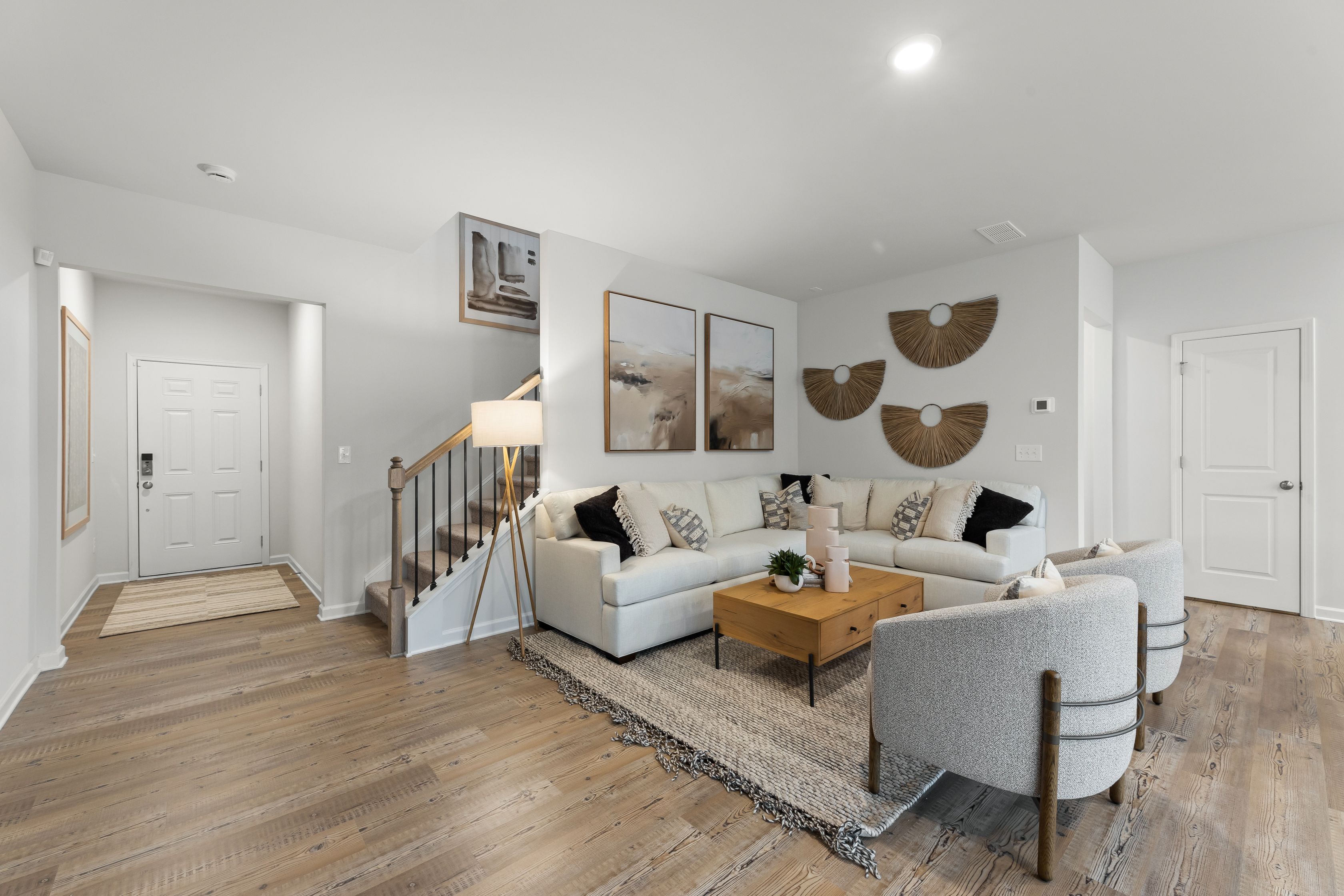 A living room with a couch and a coffee table.
