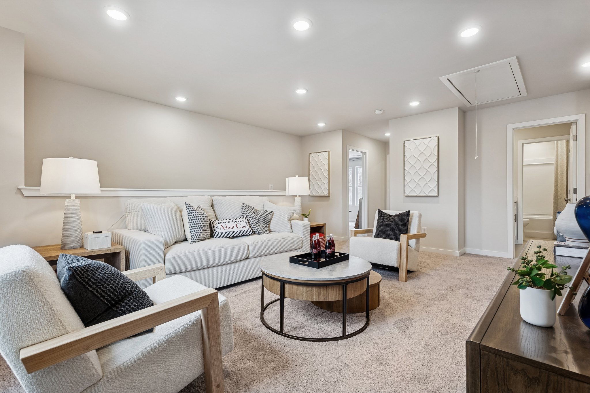 A living room with a couch and a coffee table.