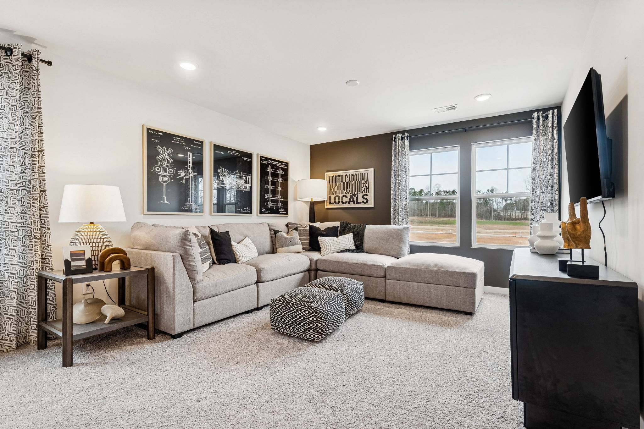 A living room with a large window.