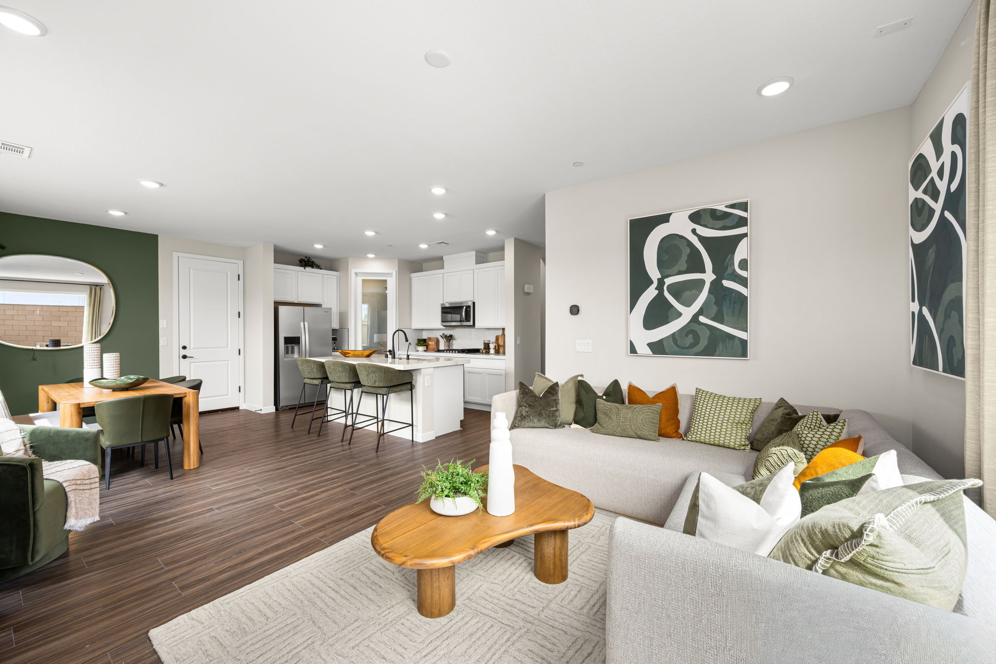 A living room with a couch and a table.