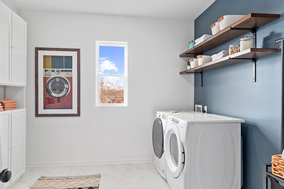 A laundry room with a washer and dryer.