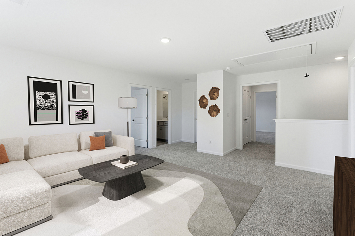 A living room with a couch and a coffee table.
