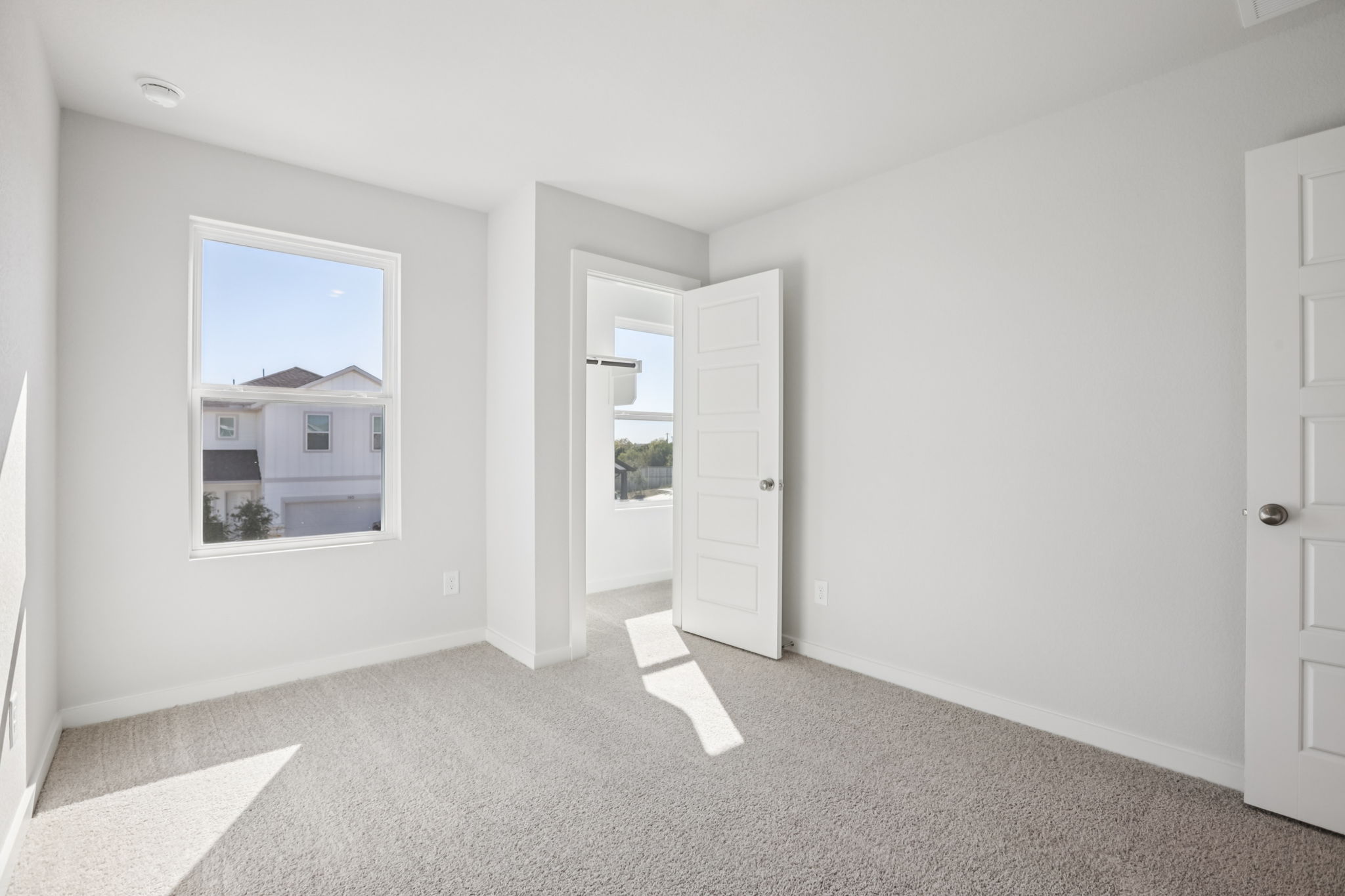 A room with white doors.