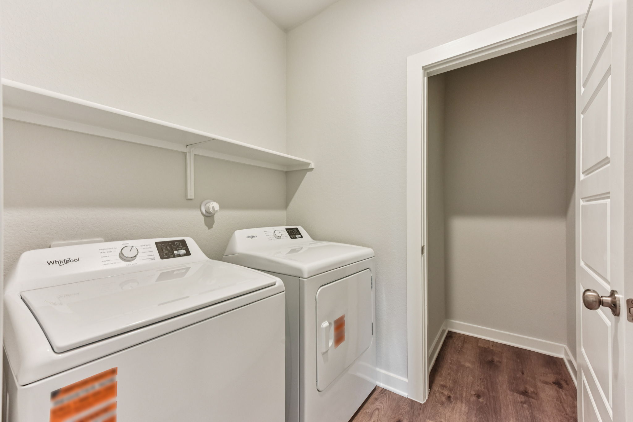 A white laundry room.