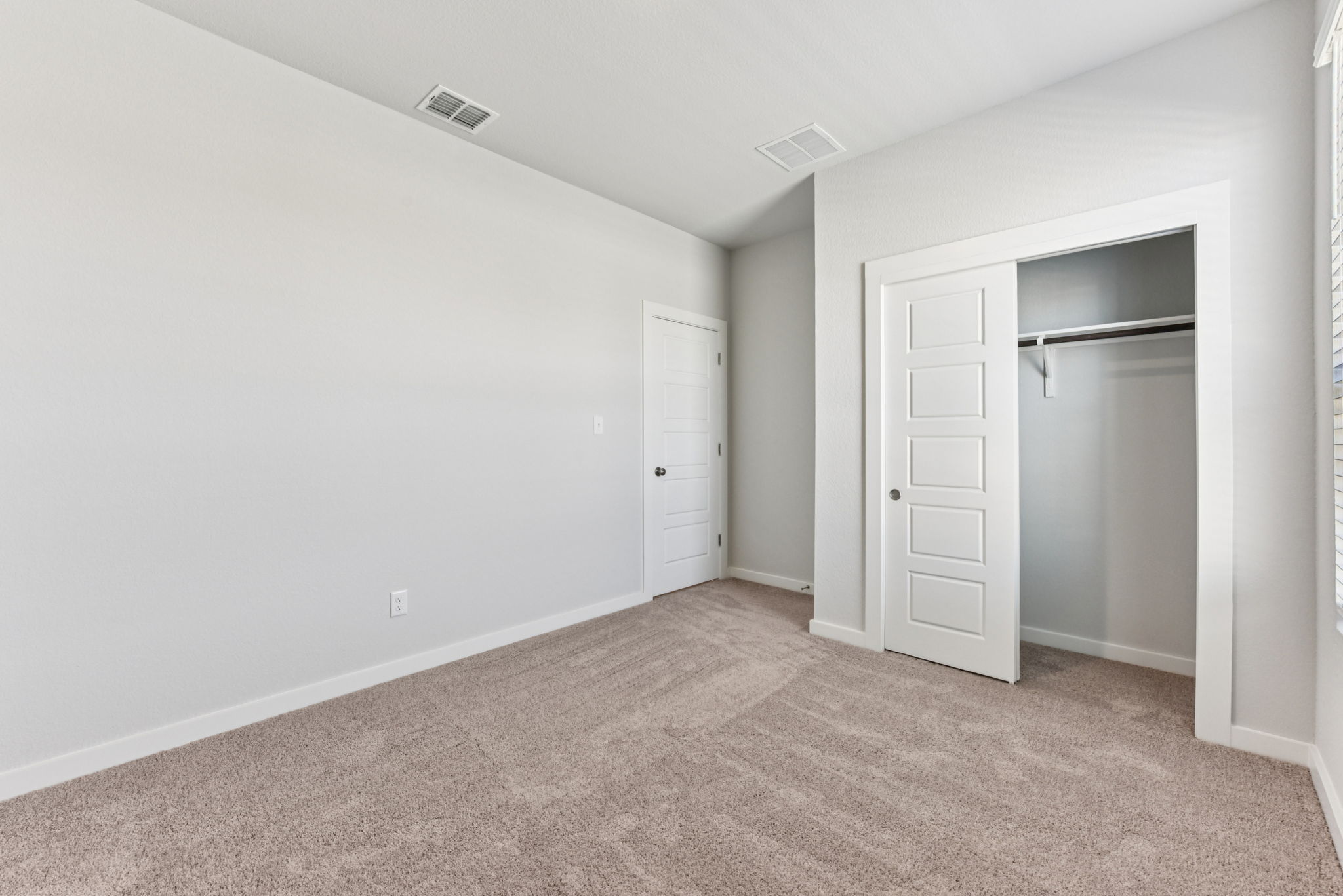 A room with white doors.