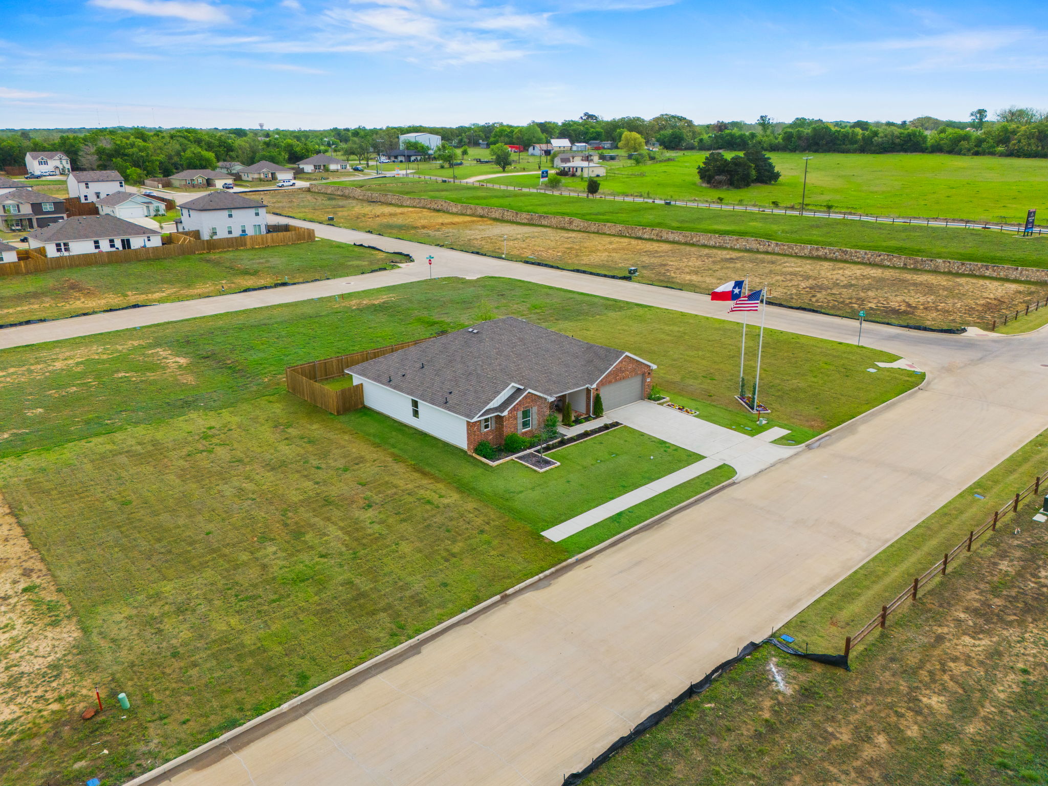 A building in a field.