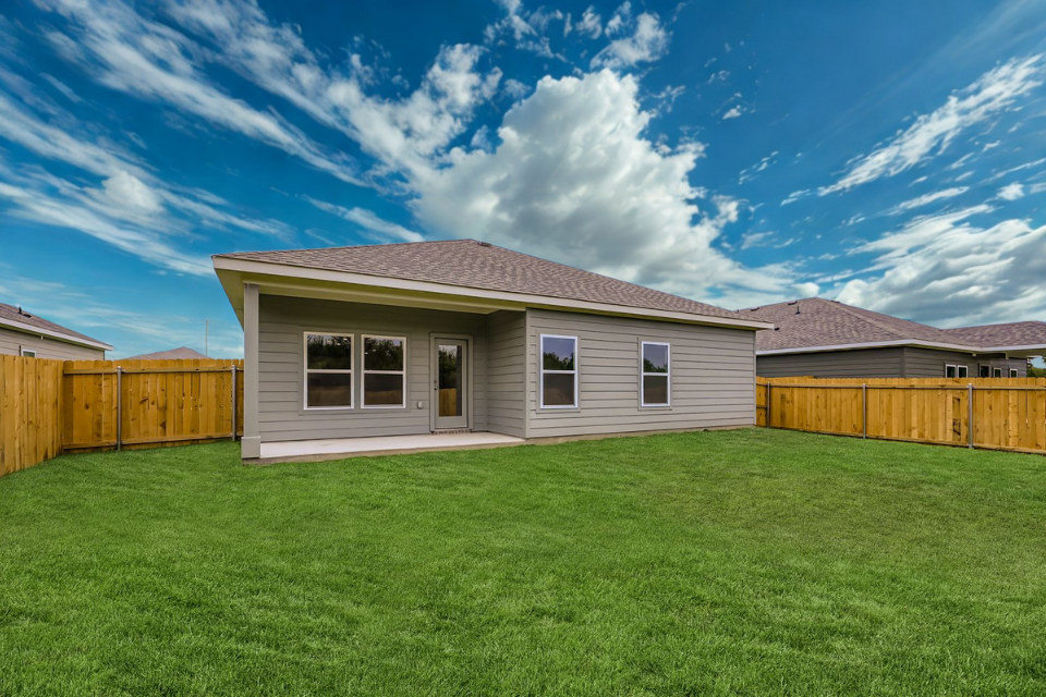 A house with a fence around it.