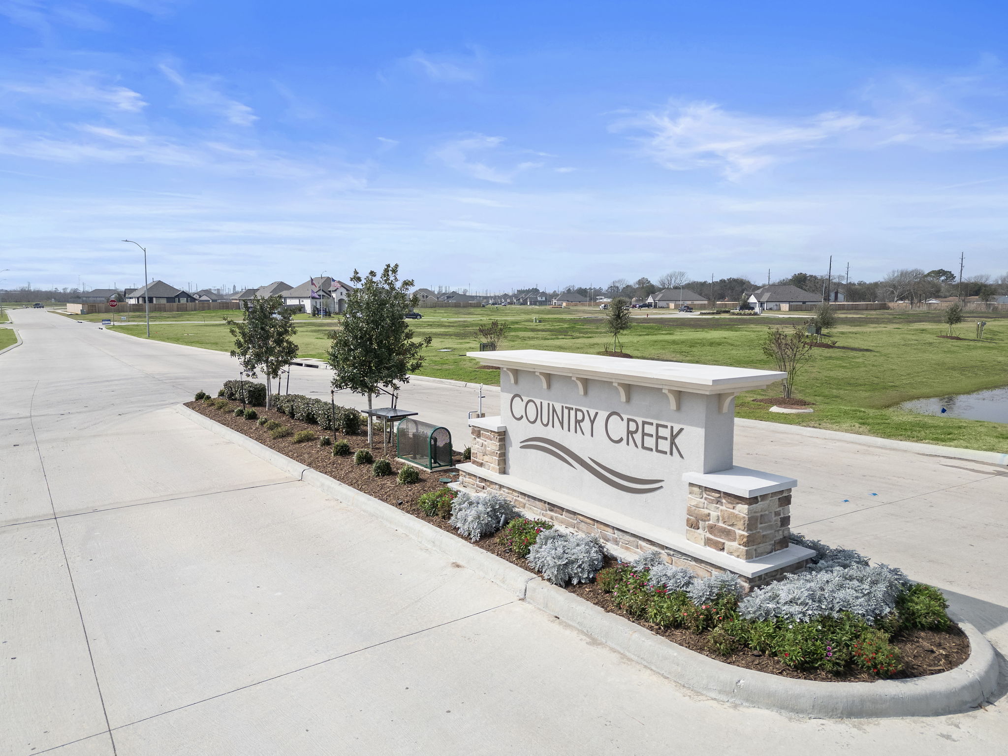 A sign on a sidewalk.