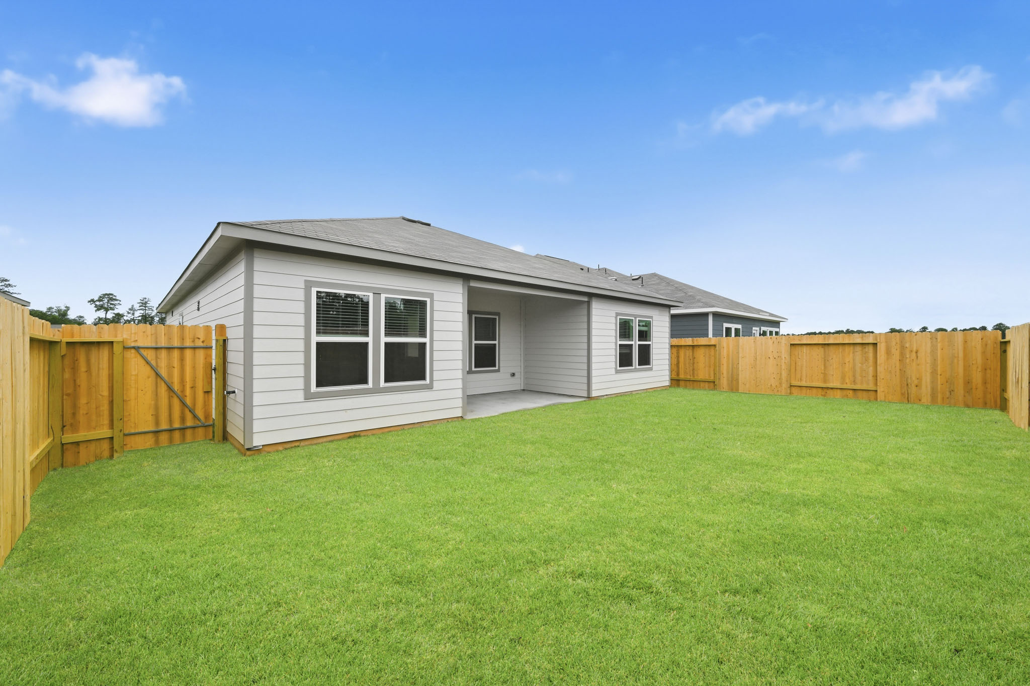 A house with a fence around it.