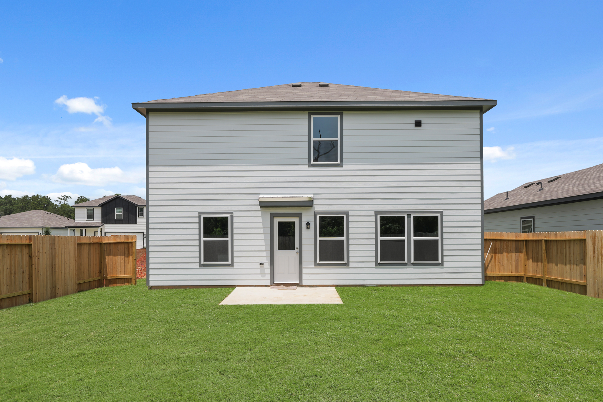 A house with a fence around it.