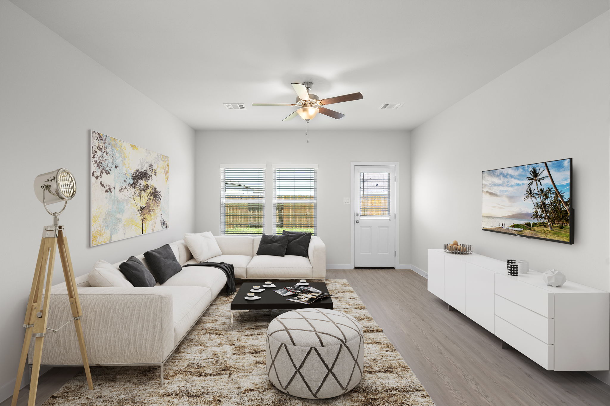 A living room with a couch and a table.
