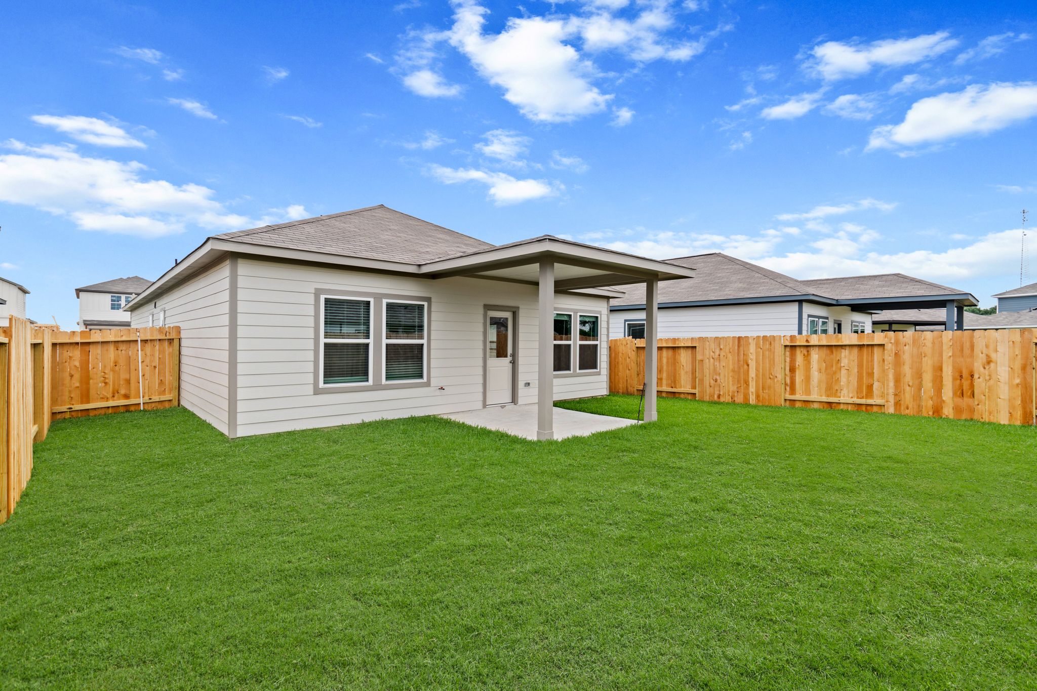 A house with a fence around it.
