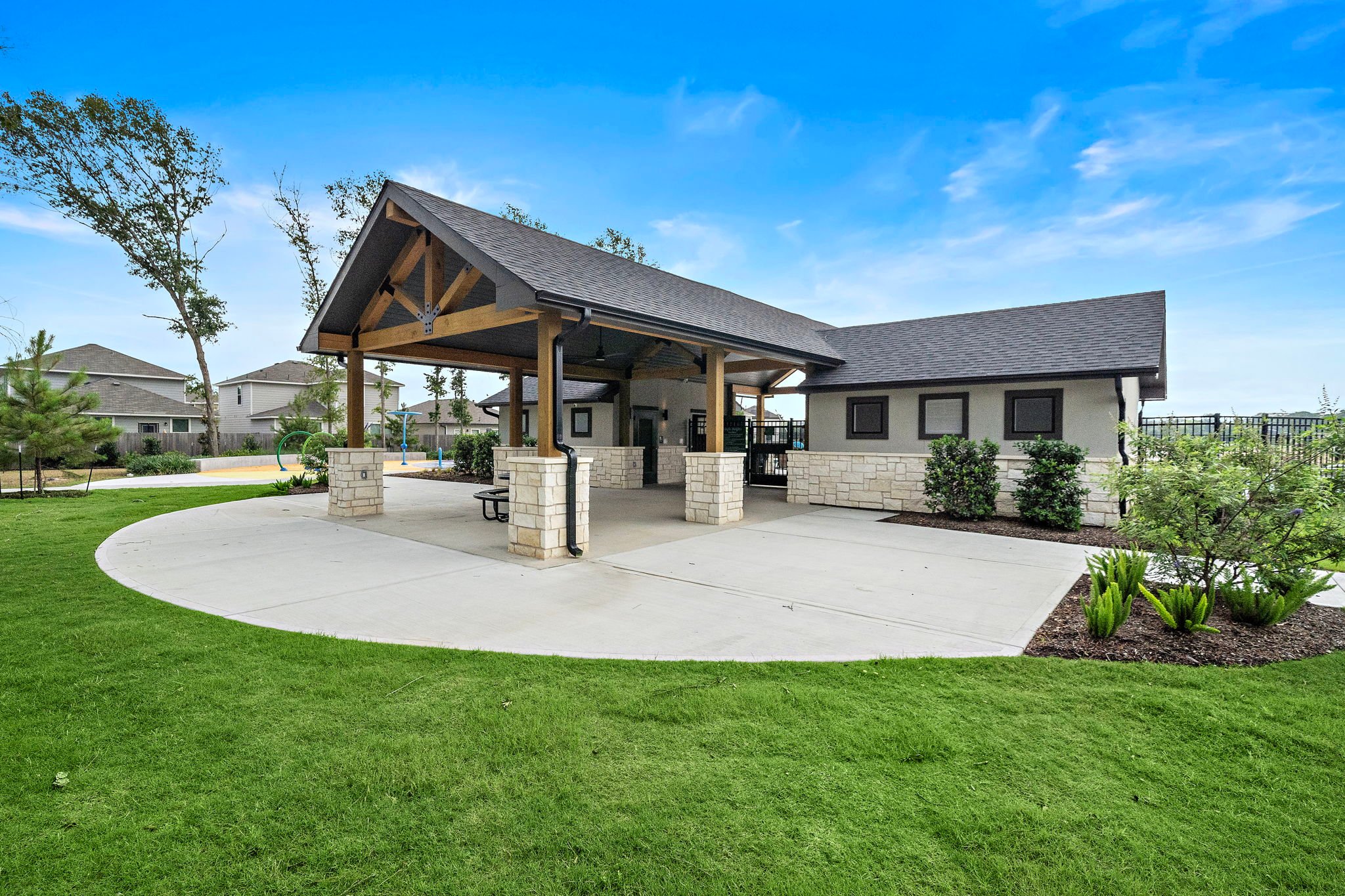 A house with a grass yard.