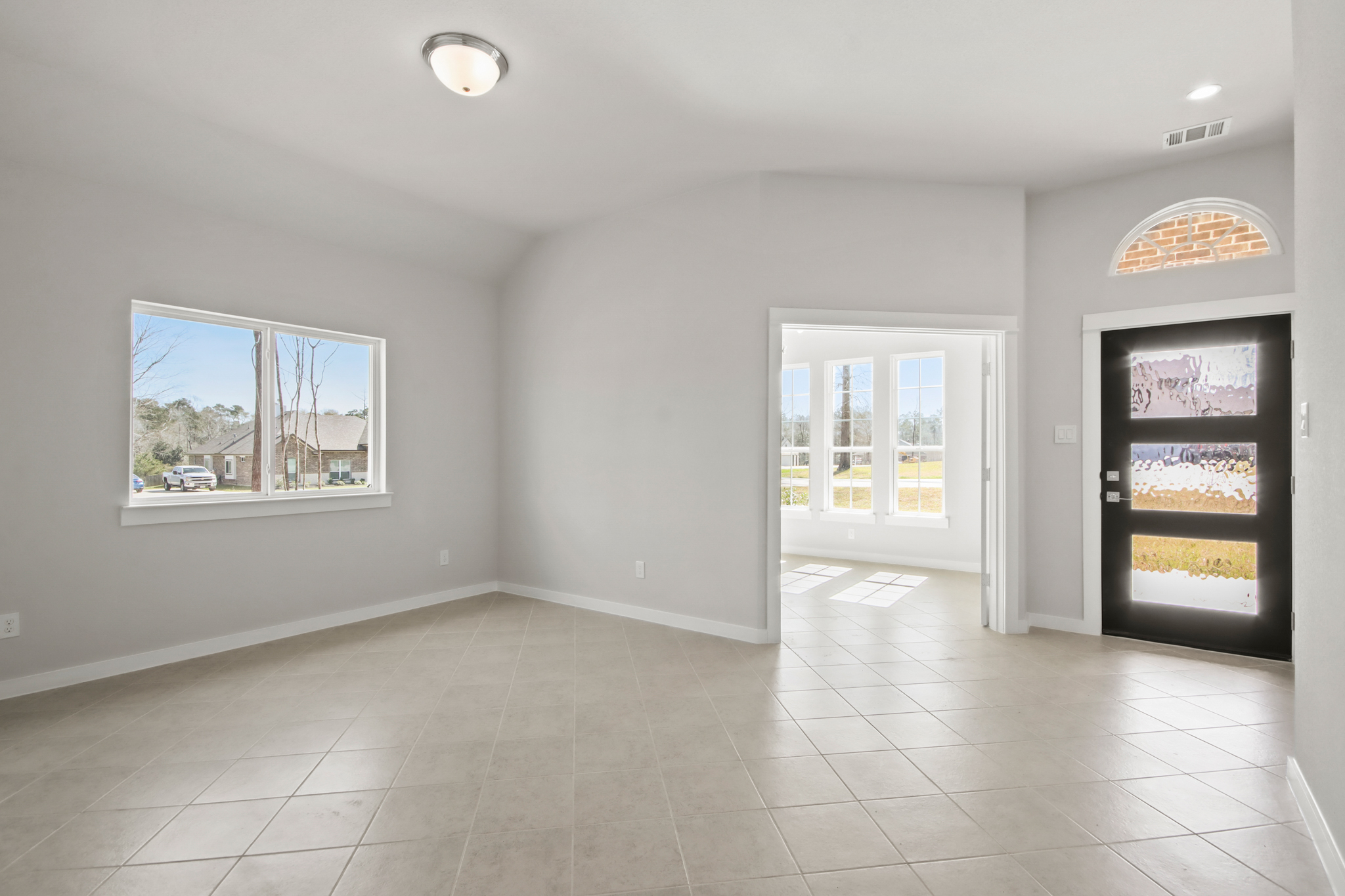 A room with windows and doors.