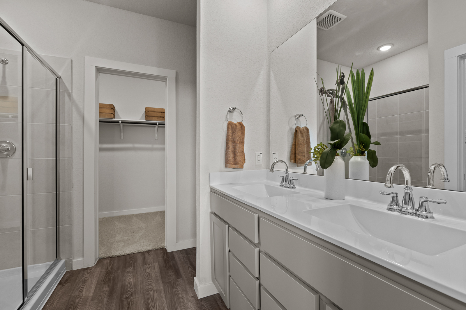 A bathroom with a glass shower.
