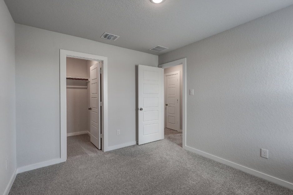 A room with white doors.