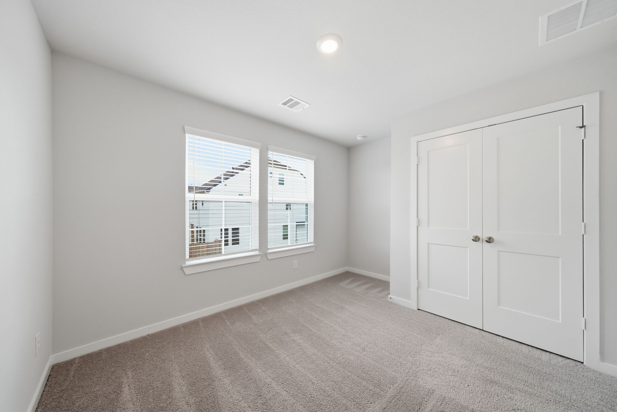 A room with white doors.
