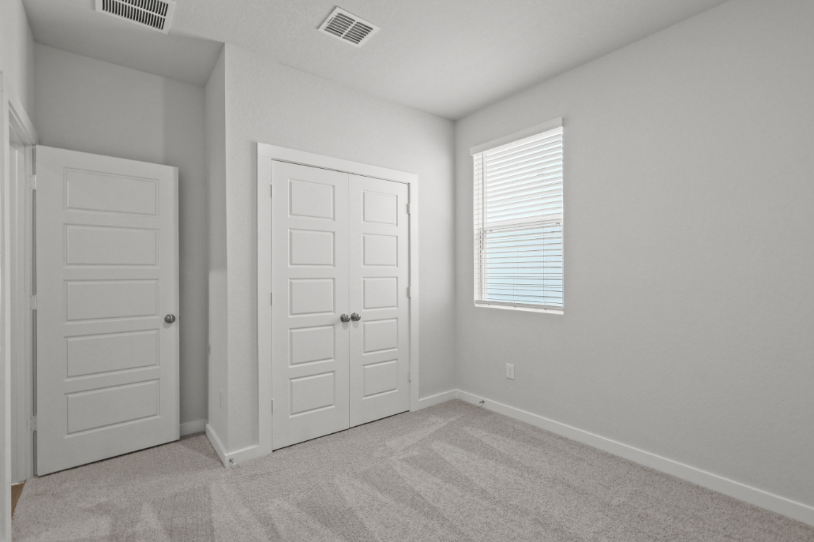 A room with white doors.