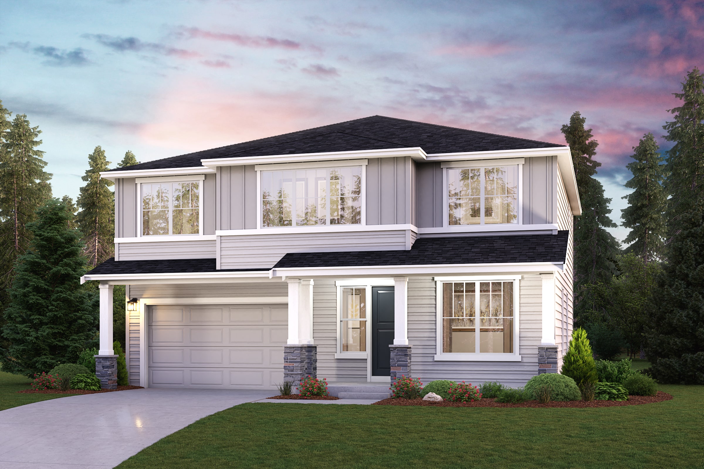 A house with a garage and trees.