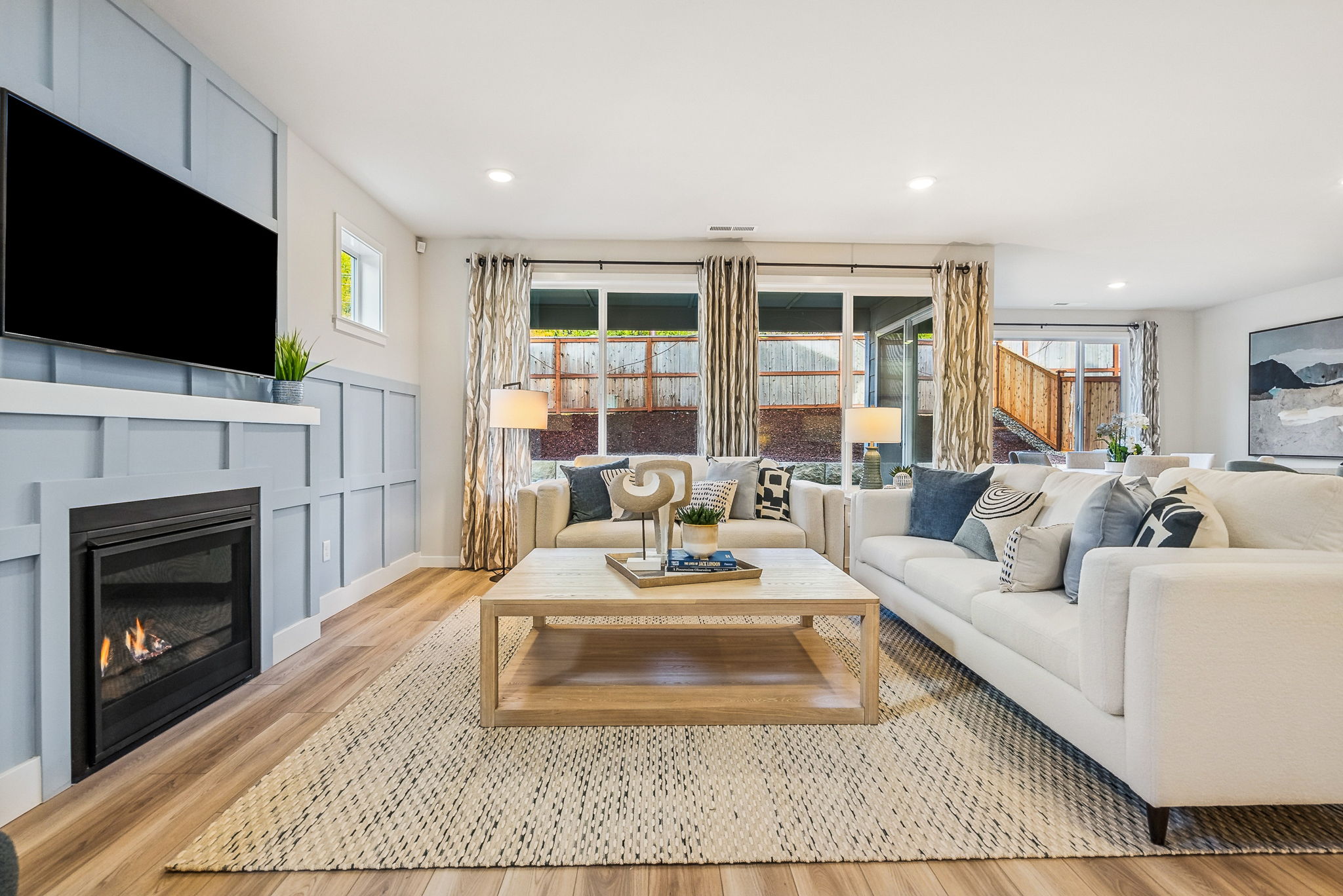 A living room with a fireplace.