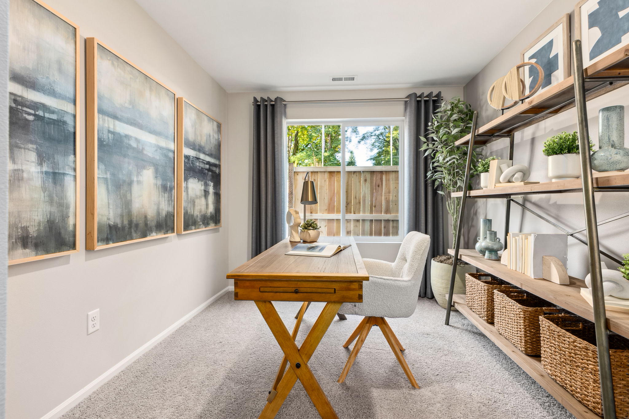 A room with a table and chairs.