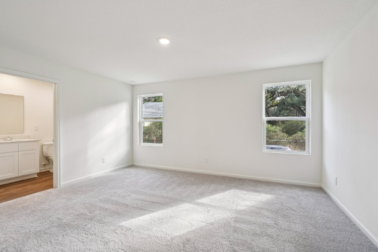 A room with a rug and a rug.