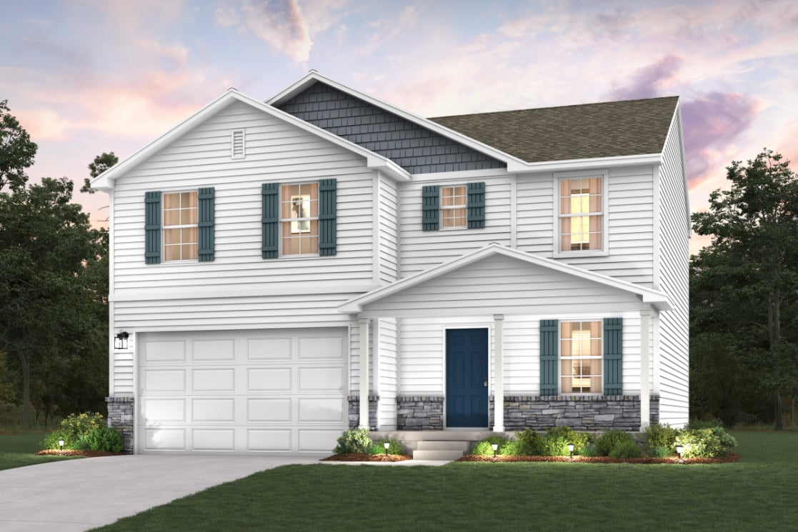 A white house with a garage.