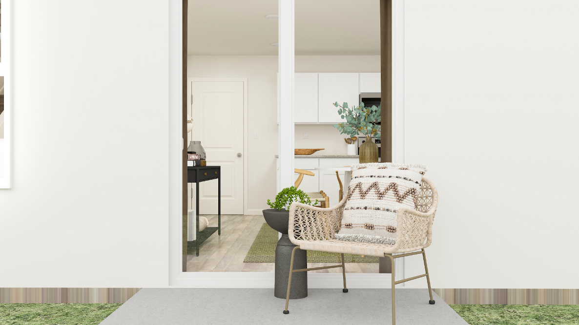 A room with a table and chairs.